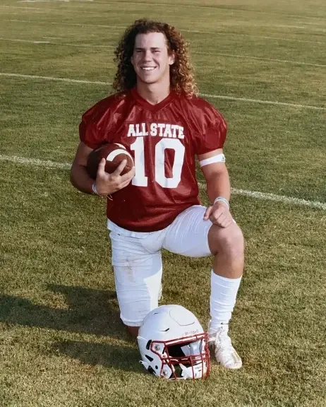Brexten Kade Green, #10, in his Cashion football uniform